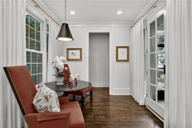 Enjoy the timeless charm of Charleston just minutes from Atlanta on Atlanta Athletic Club in Georgia - for sale on GolfHomes.com, golf home, golf lot