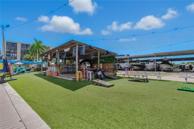 Golf Course. Inside, the living room opens to wide-open water on Cove Cay Country Club in Florida - for sale on GolfHomes.com, golf home, golf lot
