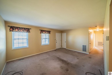 Two bedroom, 1.5-bath brick home offering 1,680 sq ft of on Calvert City Golf and Country Club in Kentucky - for sale on GolfHomes.com, golf home, golf lot