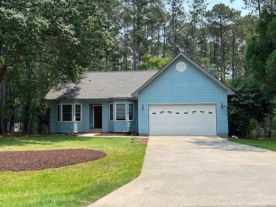 This home is a MUST SEE, perfect retreat for a privacy seeking on Monticello Golf Club At Savannah Lakes in South Carolina - for sale on GolfHomes.com, golf home, golf lot