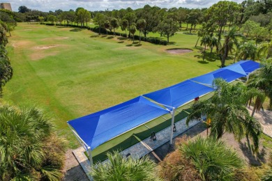 Golf Course. Inside, the living room opens to wide-open water on Cove Cay Country Club in Florida - for sale on GolfHomes.com, golf home, golf lot