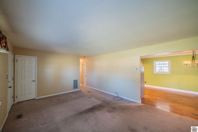 Two bedroom, 1.5-bath brick home offering 1,680 sq ft of on Calvert City Golf and Country Club in Kentucky - for sale on GolfHomes.com, golf home, golf lot