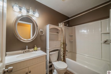 Two bedroom, 1.5-bath brick home offering 1,680 sq ft of on Calvert City Golf and Country Club in Kentucky - for sale on GolfHomes.com, golf home, golf lot