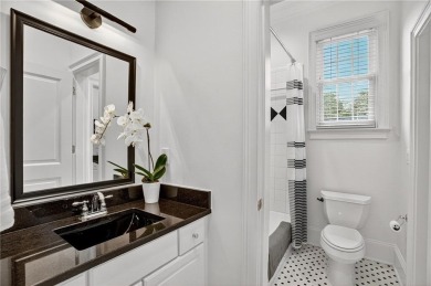 Enjoy the timeless charm of Charleston just minutes from Atlanta on Atlanta Athletic Club in Georgia - for sale on GolfHomes.com, golf home, golf lot