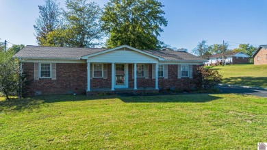 Two bedroom, 1.5-bath brick home offering 1,680 sq ft of on Calvert City Golf and Country Club in Kentucky - for sale on GolfHomes.com, golf home, golf lot