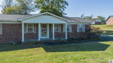 Two bedroom, 1.5-bath brick home offering 1,680 sq ft of on Calvert City Golf and Country Club in Kentucky - for sale on GolfHomes.com, golf home, golf lot