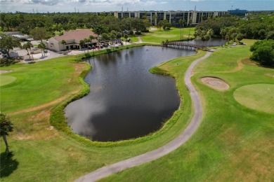Golf Course. Inside, the living room opens to wide-open water on Cove Cay Country Club in Florida - for sale on GolfHomes.com, golf home, golf lot