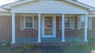 Two bedroom, 1.5-bath brick home offering 1,680 sq ft of on Calvert City Golf and Country Club in Kentucky - for sale on GolfHomes.com, golf home, golf lot