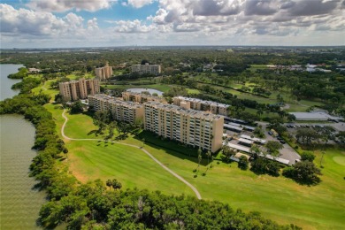 Golf Course. Inside, the living room opens to wide-open water on Cove Cay Country Club in Florida - for sale on GolfHomes.com, golf home, golf lot