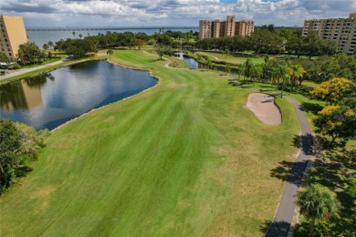 Golf Course. Inside, the living room opens to wide-open water on Cove Cay Country Club in Florida - for sale on GolfHomes.com, golf home, golf lot