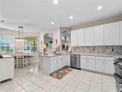 This maintenance-free, 2 BED / 2 BATH villa with a DEN in gated on Heron Creek Golf and Country Club in Florida - for sale on GolfHomes.com, golf home, golf lot