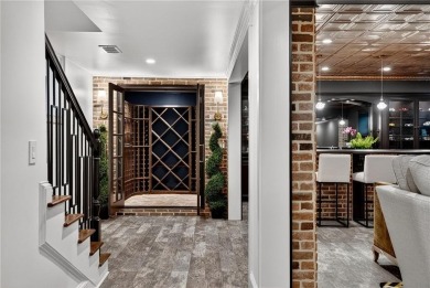 Enjoy the timeless charm of Charleston just minutes from Atlanta on Atlanta Athletic Club in Georgia - for sale on GolfHomes.com, golf home, golf lot