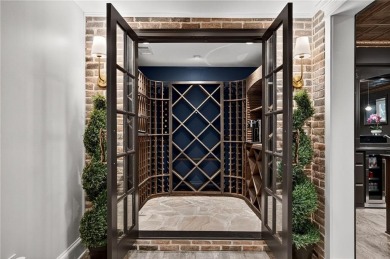 Enjoy the timeless charm of Charleston just minutes from Atlanta on Atlanta Athletic Club in Georgia - for sale on GolfHomes.com, golf home, golf lot