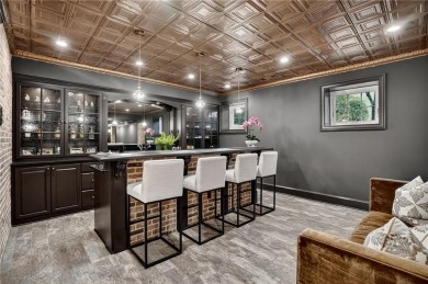 Enjoy the timeless charm of Charleston just minutes from Atlanta on Atlanta Athletic Club in Georgia - for sale on GolfHomes.com, golf home, golf lot