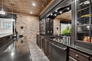 Enjoy the timeless charm of Charleston just minutes from Atlanta on Atlanta Athletic Club in Georgia - for sale on GolfHomes.com, golf home, golf lot