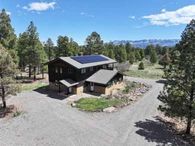 Nestled among tall Ponderosa Pine trees and less than one hour on The Divide Ranch and Club in Colorado - for sale on GolfHomes.com, golf home, golf lot