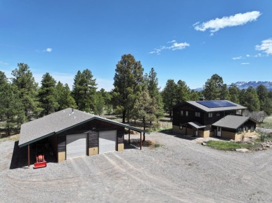 Nestled among tall Ponderosa Pine trees and less than one hour on The Divide Ranch and Club in Colorado - for sale on GolfHomes.com, golf home, golf lot