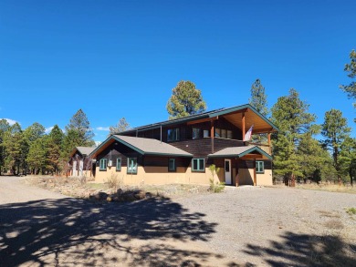 Nestled among tall Ponderosa Pine trees and less than one hour on The Divide Ranch and Club in Colorado - for sale on GolfHomes.com, golf home, golf lot