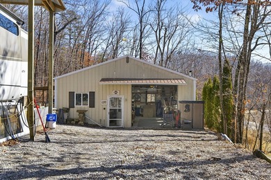 This custom home on 4 acres was created w/ tons of open space on Mountain Ridge Golf Club in Tennessee - for sale on GolfHomes.com, golf home, golf lot
