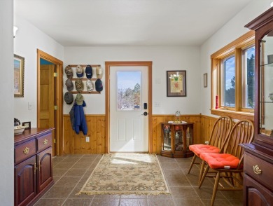 Nestled among tall Ponderosa Pine trees and less than one hour on The Divide Ranch and Club in Colorado - for sale on GolfHomes.com, golf home, golf lot