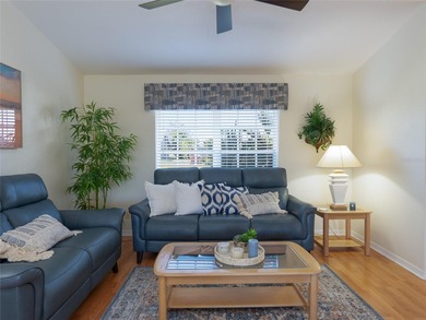 Discover Florida living in this immaculately maintained heated on Rotonda Golf and Country Club The Palms Course in Florida - for sale on GolfHomes.com, golf home, golf lot