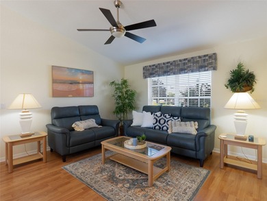 Discover Florida living in this immaculately maintained heated on Rotonda Golf and Country Club The Palms Course in Florida - for sale on GolfHomes.com, golf home, golf lot