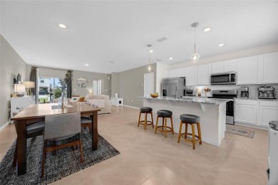 Fall in love with this stylish DR Horton *Ibis* townhome in the on Orange County National Golf Center and Lodge in Florida - for sale on GolfHomes.com, golf home, golf lot