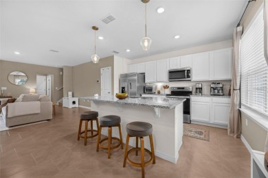 Fall in love with this stylish DR Horton *Ibis* townhome in the on Orange County National Golf Center and Lodge in Florida - for sale on GolfHomes.com, golf home, golf lot