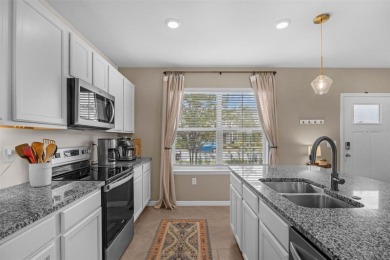 Fall in love with this stylish DR Horton *Ibis* townhome in the on Orange County National Golf Center and Lodge in Florida - for sale on GolfHomes.com, golf home, golf lot