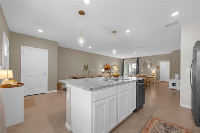 Fall in love with this stylish DR Horton *Ibis* townhome in the on Orange County National Golf Center and Lodge in Florida - for sale on GolfHomes.com, golf home, golf lot