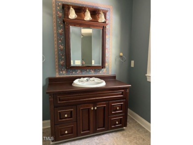This 2 bedroom 2.5 bath ranch home located in a gated golf on Carolina Trace Country Club in North Carolina - for sale on GolfHomes.com, golf home, golf lot