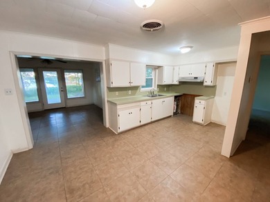 This 2 bedroom, 1 bath camp is located across from Lake Bruin on Lake Bruin Golf and Country Club in Louisiana - for sale on GolfHomes.com, golf home, golf lot