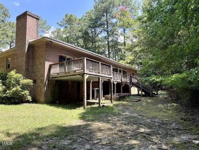 This 2 bedroom 2.5 bath ranch home located in a gated golf on Carolina Trace Country Club in North Carolina - for sale on GolfHomes.com, golf home, golf lot
