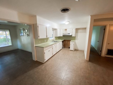 This 2 bedroom, 1 bath camp is located across from Lake Bruin on Lake Bruin Golf and Country Club in Louisiana - for sale on GolfHomes.com, golf home, golf lot