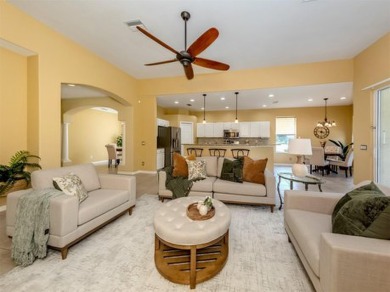 Step into paradise with this exquisite 3-bedroom, 2.5-bathroom on Heron Creek Golf and Country Club in Florida - for sale on GolfHomes.com, golf home, golf lot