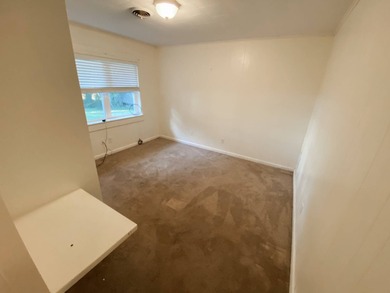 This 2 bedroom, 1 bath camp is located across from Lake Bruin on Lake Bruin Golf and Country Club in Louisiana - for sale on GolfHomes.com, golf home, golf lot