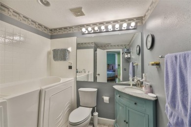MAINTENANCE-FREE Living & MOVE-IN Ready! Welcome to effortless on The Golf Club of Cypress Creek in Florida - for sale on GolfHomes.com, golf home, golf lot