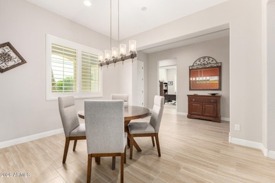 LIVING & LOVING THE ARIZONA DREAM!! This beautiful Endeavor on Poston Butte Golf Club in Arizona - for sale on GolfHomes.com, golf home, golf lot