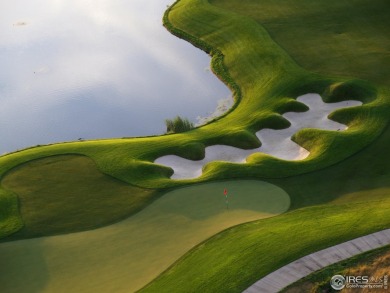 This brand-new luxury paired home at Morning Song captures the on Harmony Golf Club in Colorado - for sale on GolfHomes.com, golf home, golf lot