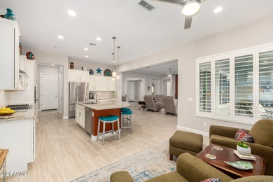 LIVING & LOVING THE ARIZONA DREAM!! This beautiful Endeavor on Poston Butte Golf Club in Arizona - for sale on GolfHomes.com, golf home, golf lot