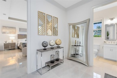 Welcome to an architectural gem in the esteemed Eagle Creek on Eagle Creek Golf Club in Florida - for sale on GolfHomes.com, golf home, golf lot
