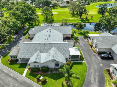 MAINTENANCE-FREE Living & MOVE-IN Ready! Welcome to effortless on The Golf Club of Cypress Creek in Florida - for sale on GolfHomes.com, golf home, golf lot