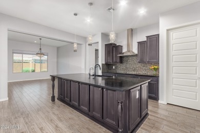 Discover this stunning Serenity model on a corner lot in the on Copper Canyon Golf Club in Arizona - for sale on GolfHomes.com, golf home, golf lot