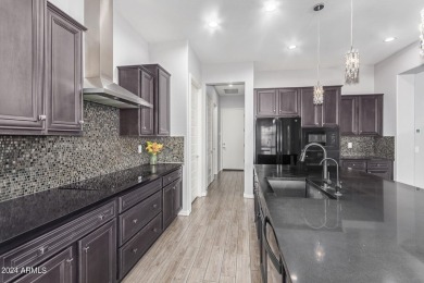 Discover this stunning Serenity model on a corner lot in the on Copper Canyon Golf Club in Arizona - for sale on GolfHomes.com, golf home, golf lot