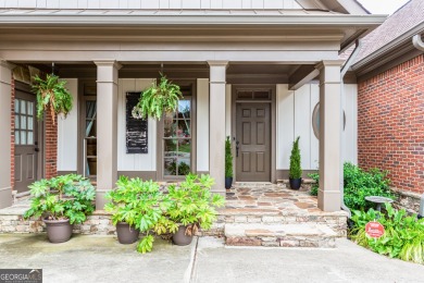 Welcome to this stunning 6-bedroom, 4.5-bathroom ranch home on Traditions of Braselton Golf Club in Georgia - for sale on GolfHomes.com, golf home, golf lot