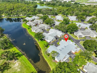 MAINTENANCE-FREE Living & MOVE-IN Ready! Welcome to effortless on The Golf Club of Cypress Creek in Florida - for sale on GolfHomes.com, golf home, golf lot