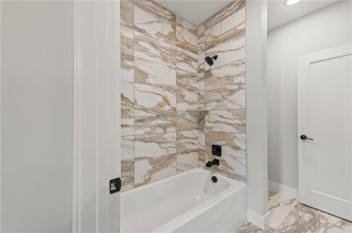 Experience luxury, comfort, and thoughtful design in The on Shoal Creek Golf Course in Missouri - for sale on GolfHomes.com, golf home, golf lot