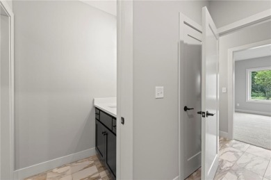 Experience luxury, comfort, and thoughtful design in The on Shoal Creek Golf Course in Missouri - for sale on GolfHomes.com, golf home, golf lot