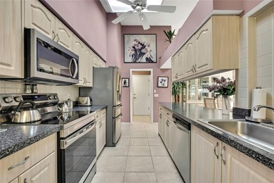 Welcome to this bright and spacious Oakmont villa located in the on Timber Pines Golf Course in Florida - for sale on GolfHomes.com, golf home, golf lot