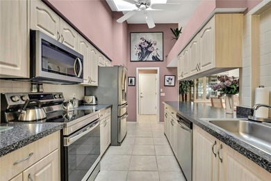 Welcome to this bright and spacious Oakmont villa located in the on Timber Pines Golf Course in Florida - for sale on GolfHomes.com, golf home, golf lot